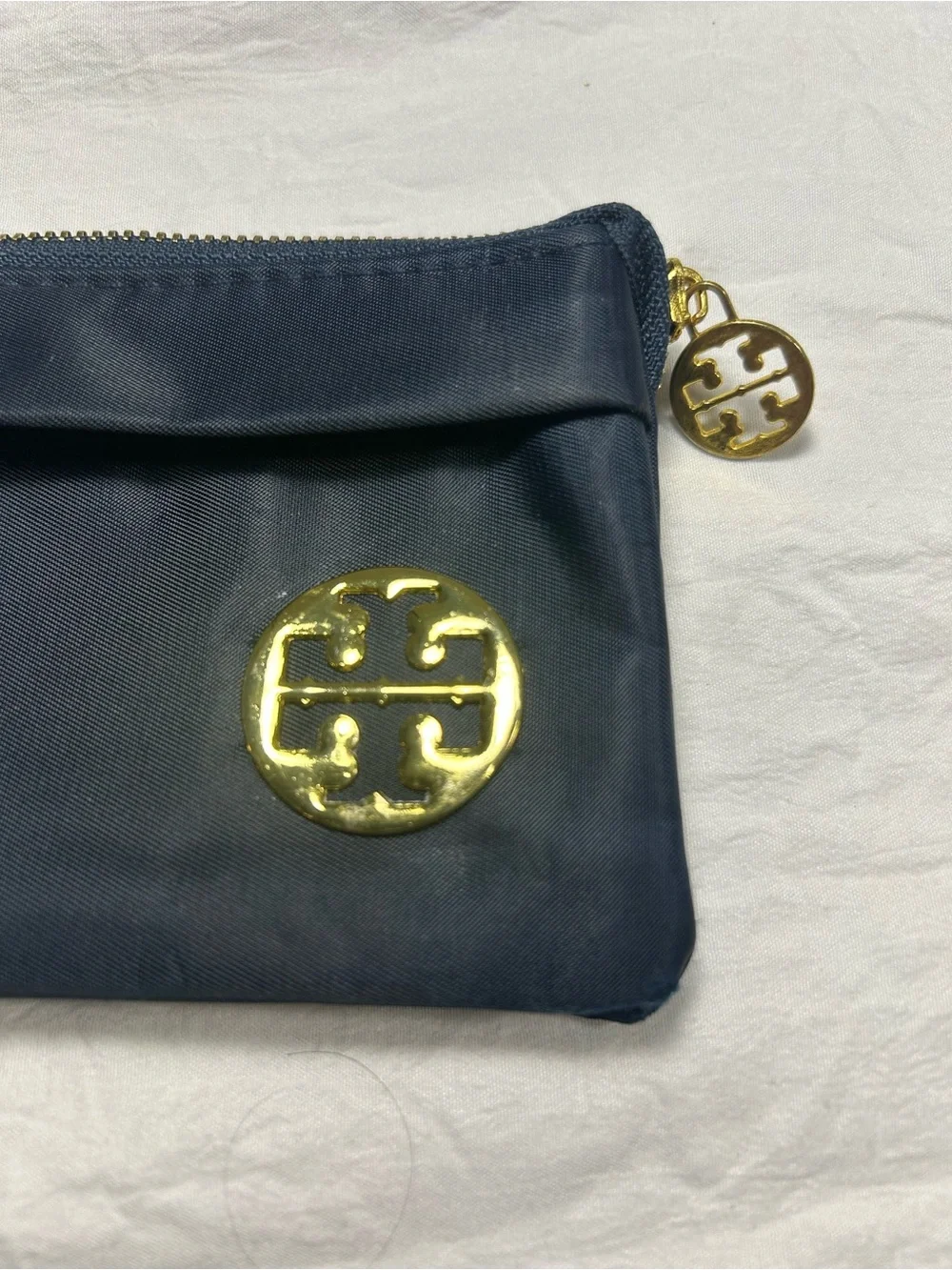Tory Burch Navy Wristlet with Gold Emblem